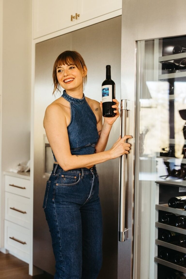 woman with wine for first time dinner party