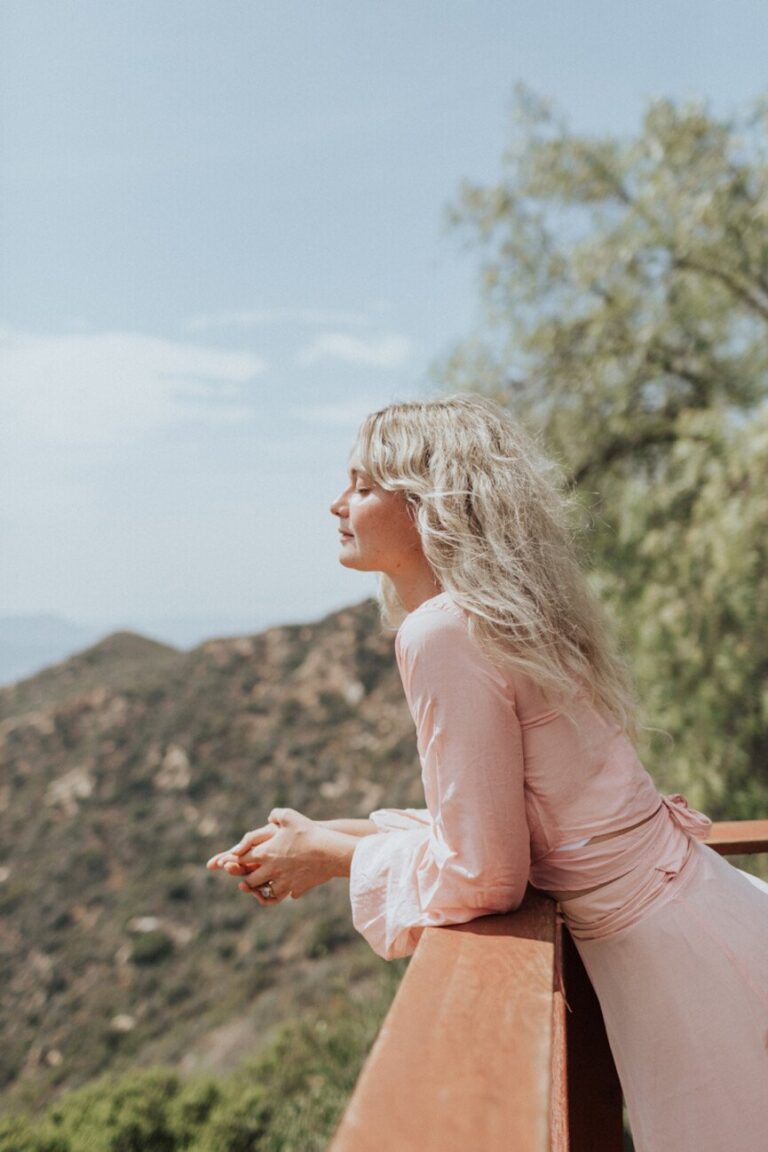 woman wearing pink dress 865x1298