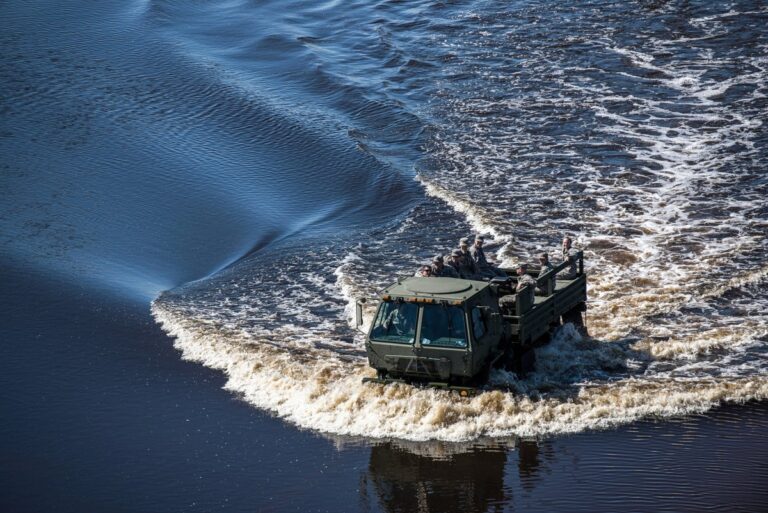 U S Air Force airmen drive onto the flightline
